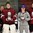 LUCERNE, SWITZERLAND - APRIL 24: Latvia's Mareks Mitens #30, Denijs Romanovskis #1 and Kristaps Zile #7 were named the Top Three Players for their team after a 5-3 relegation round win over Germany at the 2015 IIHF Ice Hockey U18 World Championship. (Photo by Matt Zambonin/HHOF-IIHF Images)

